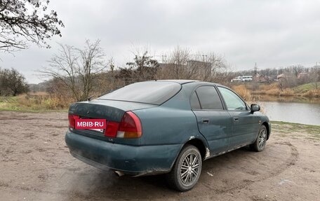 Mitsubishi Carisma I, 1998 год, 235 000 рублей, 6 фотография