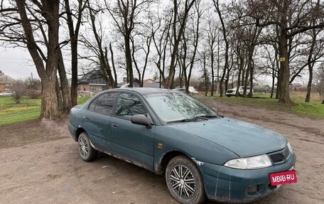 Mitsubishi Carisma I, 1998 год, 235 000 рублей, 7 фотография