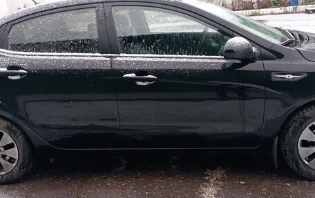 KIA Rio III рестайлинг, 2013 год, 705 000 рублей, 19 фотография