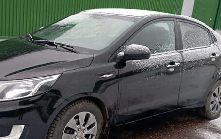 KIA Rio III рестайлинг, 2013 год, 705 000 рублей, 21 фотография