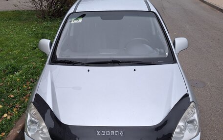 KIA Carens III (RP), 2011 год, 720 000 рублей, 3 фотография