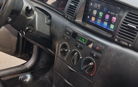 Toyota Corolla, 2004 год, 550 000 рублей, 11 фотография