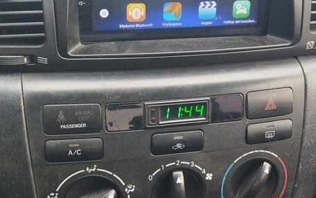 Toyota Corolla, 2004 год, 550 000 рублей, 9 фотография