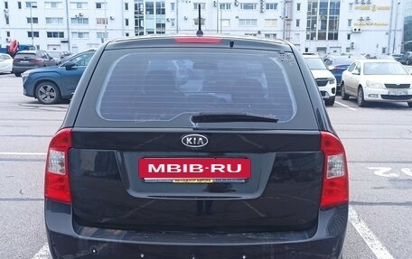KIA Carens III (RP), 2011 год, 530 000 рублей, 3 фотография