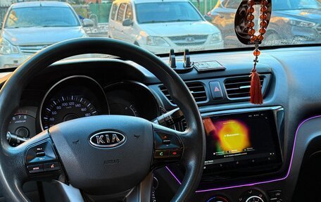 KIA Rio III рестайлинг, 2011 год, 700 000 рублей, 9 фотография