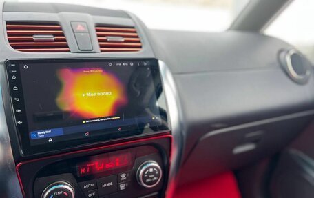 Suzuki SX4 II рестайлинг, 2010 год, 887 000 рублей, 13 фотография