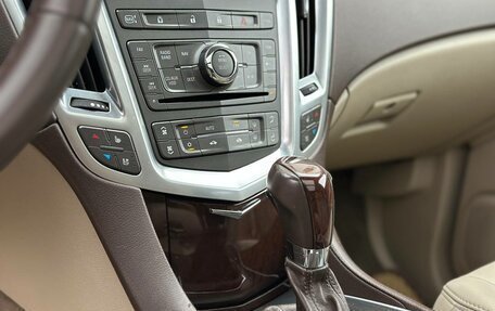 Cadillac SRX II рестайлинг, 2010 год, 1 090 000 рублей, 18 фотография