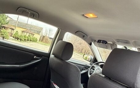 Toyota Corolla, 2003 год, 850 000 рублей, 11 фотография