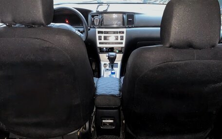 Toyota Corolla, 2004 год, 14 фотография