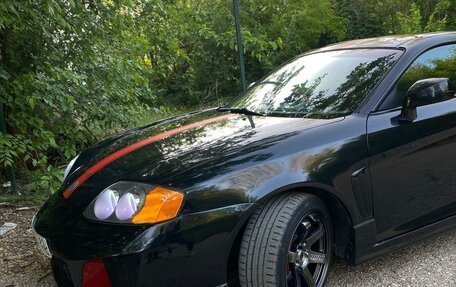 Hyundai Coupe II рестайлинг, 2003 год, 670 000 рублей, 22 фотография