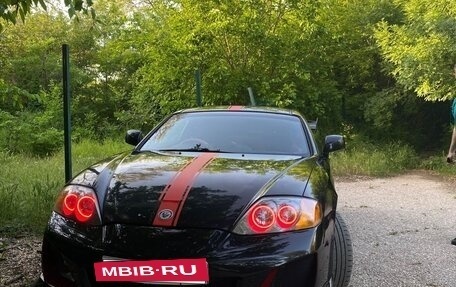 Hyundai Coupe II рестайлинг, 2003 год, 670 000 рублей, 25 фотография