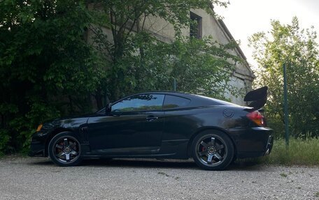 Hyundai Coupe II рестайлинг, 2003 год, 670 000 рублей, 28 фотография