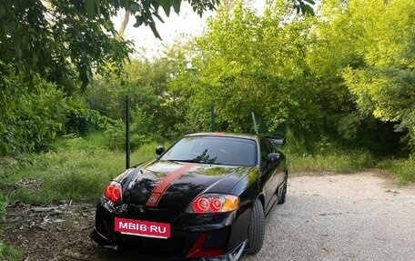 Hyundai Coupe II рестайлинг, 2003 год, 670 000 рублей, 27 фотография