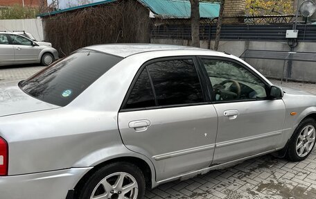 Mazda Familia, 2001 год, 230 000 рублей, 2 фотография