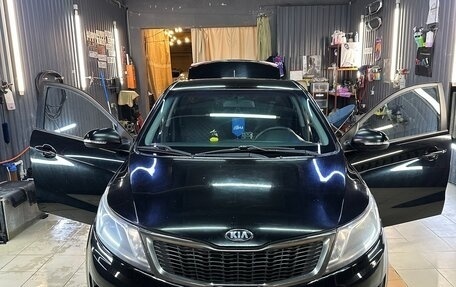 KIA Rio III рестайлинг, 2012 год, 770 000 рублей, 15 фотография