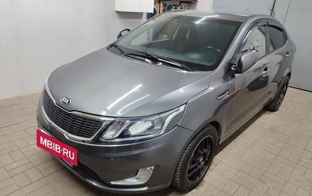 KIA Rio III рестайлинг, 2013 год, 890 000 рублей, 23 фотография