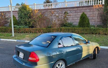 Mitsubishi Mirage VI рестайлинг, 1998 год, 230 000 рублей, 3 фотография