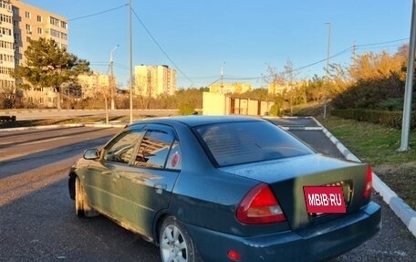 Mitsubishi Mirage VI рестайлинг, 1998 год, 230 000 рублей, 2 фотография