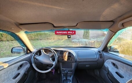 Mitsubishi Mirage VI рестайлинг, 1998 год, 230 000 рублей, 7 фотография