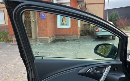 Opel Astra J, 2013 год, 12 фотография