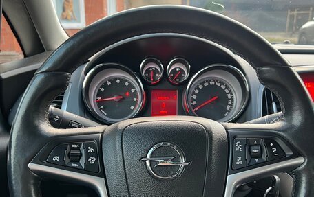 Opel Astra J, 2013 год, 25 фотография