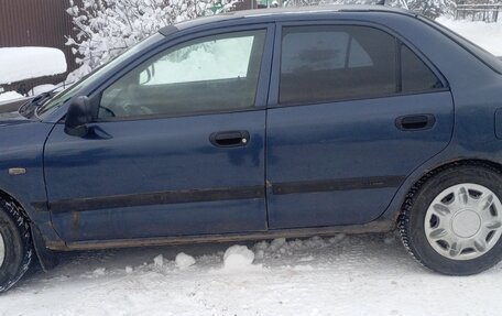 Mitsubishi Carisma I, 2001 год, 140 000 рублей, 3 фотография