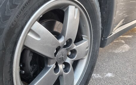 Mitsubishi Outlander III рестайлинг 3, 2014 год, 1 250 000 рублей, 24 фотография