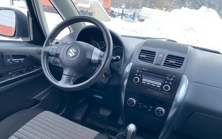 Suzuki SX4 II рестайлинг, 2010 год, 835 000 рублей, 24 фотография
