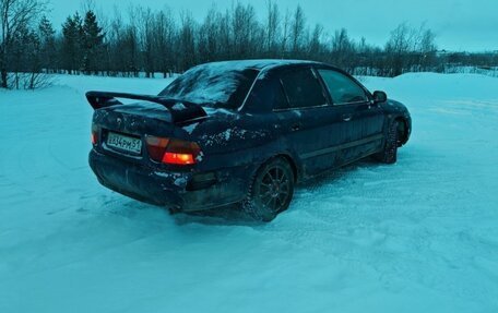 Mitsubishi Carisma I, 1998 год, 140 000 рублей, 6 фотография