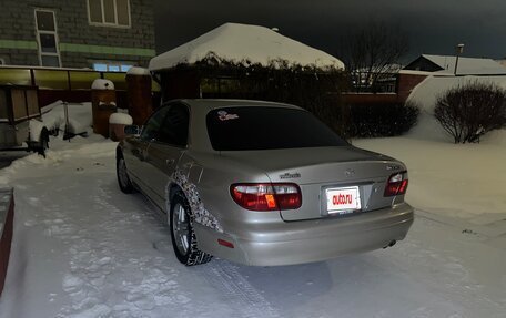 Mazda Millenia I рестайлинг, 1997 год, 650 000 рублей, 3 фотография