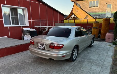 Mazda Millenia I рестайлинг, 1997 год, 650 000 рублей, 18 фотография