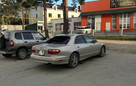 Mazda Millenia I рестайлинг, 1997 год, 650 000 рублей, 14 фотография