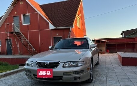 Mazda Millenia I рестайлинг, 1997 год, 650 000 рублей, 21 фотография