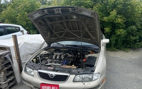 Mazda Millenia I рестайлинг, 1997 год, 650 000 рублей, 24 фотография