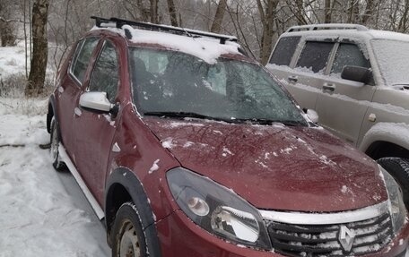 Renault Sandero I, 2013 год, 700 000 рублей, 2 фотография