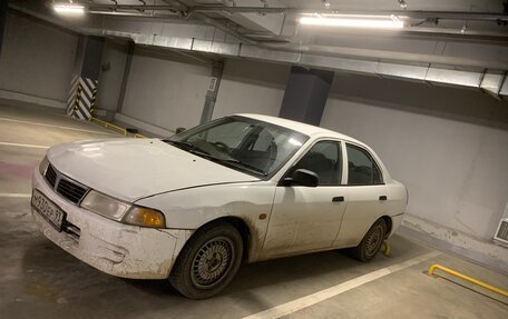 Mitsubishi Mirage VI рестайлинг, 1999 год, 170 000 рублей, 3 фотография