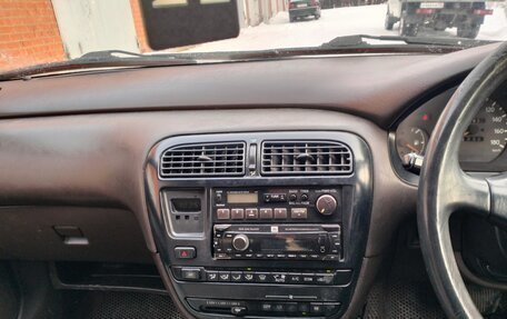 Toyota Carina, 1992 год, 227 000 рублей, 8 фотография