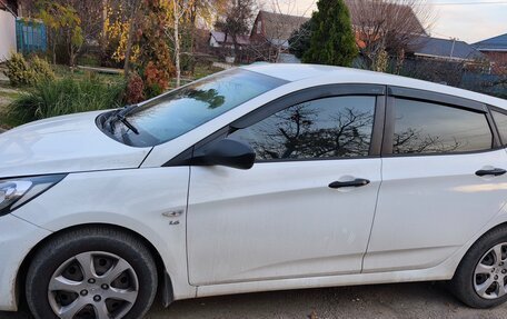 Hyundai Solaris II рестайлинг, 2013 год, 730 000 рублей, 2 фотография