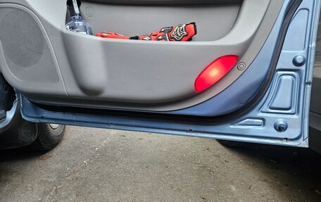 KIA Carnival III, 2007 год, 900 000 рублей, 11 фотография