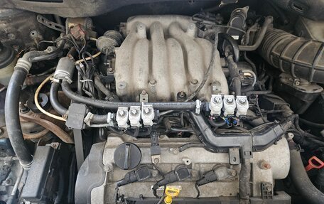 KIA Carnival III, 2007 год, 900 000 рублей, 22 фотография