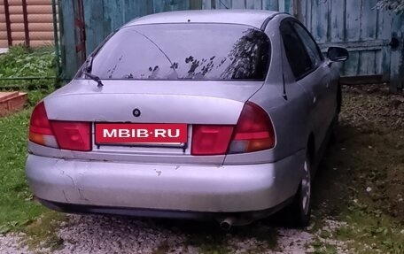 Mitsubishi Carisma I, 1997 год, 100 000 рублей, 2 фотография
