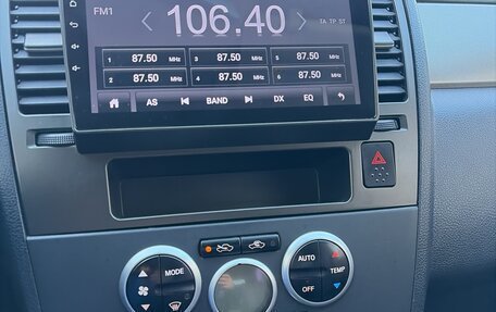 Nissan Tiida, 2010 год, 750 000 рублей, 11 фотография