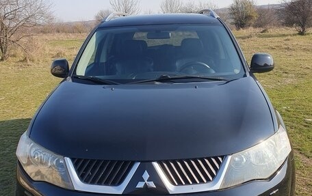 Mitsubishi Outlander III рестайлинг 3, 2008 год, 1 159 000 рублей, 1 фотография