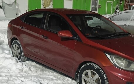 Hyundai Solaris II рестайлинг, 2011 год, 650 000 рублей, 3 фотография