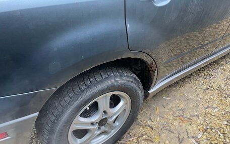 Mitsubishi Outlander III рестайлинг 3, 2003 год, 750 000 рублей, 11 фотография