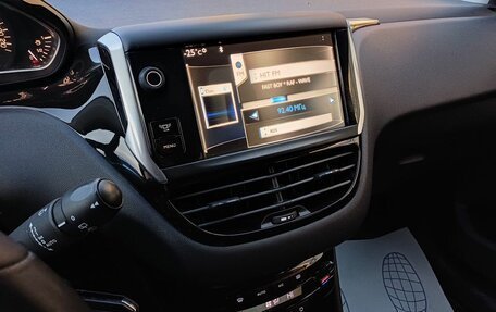 Peugeot 208 II, 2013 год, 549 000 рублей, 9 фотография