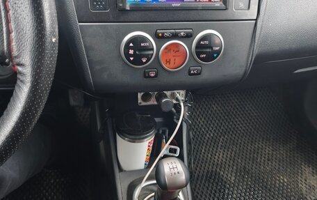 Nissan Tiida, 2010 год, 580 000 рублей, 11 фотография