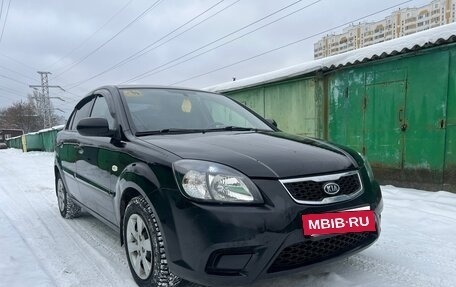 KIA Rio II, 2011 год, 795 000 рублей, 11 фотография