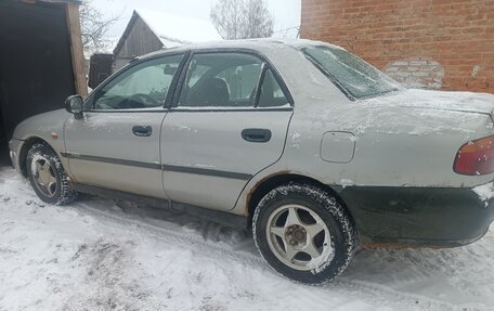 Mitsubishi Carisma I, 1998 год, 150 000 рублей, 9 фотография