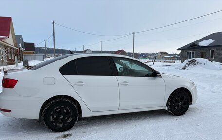 Volkswagen Jetta VI, 2013 год, 900 000 рублей, 3 фотография